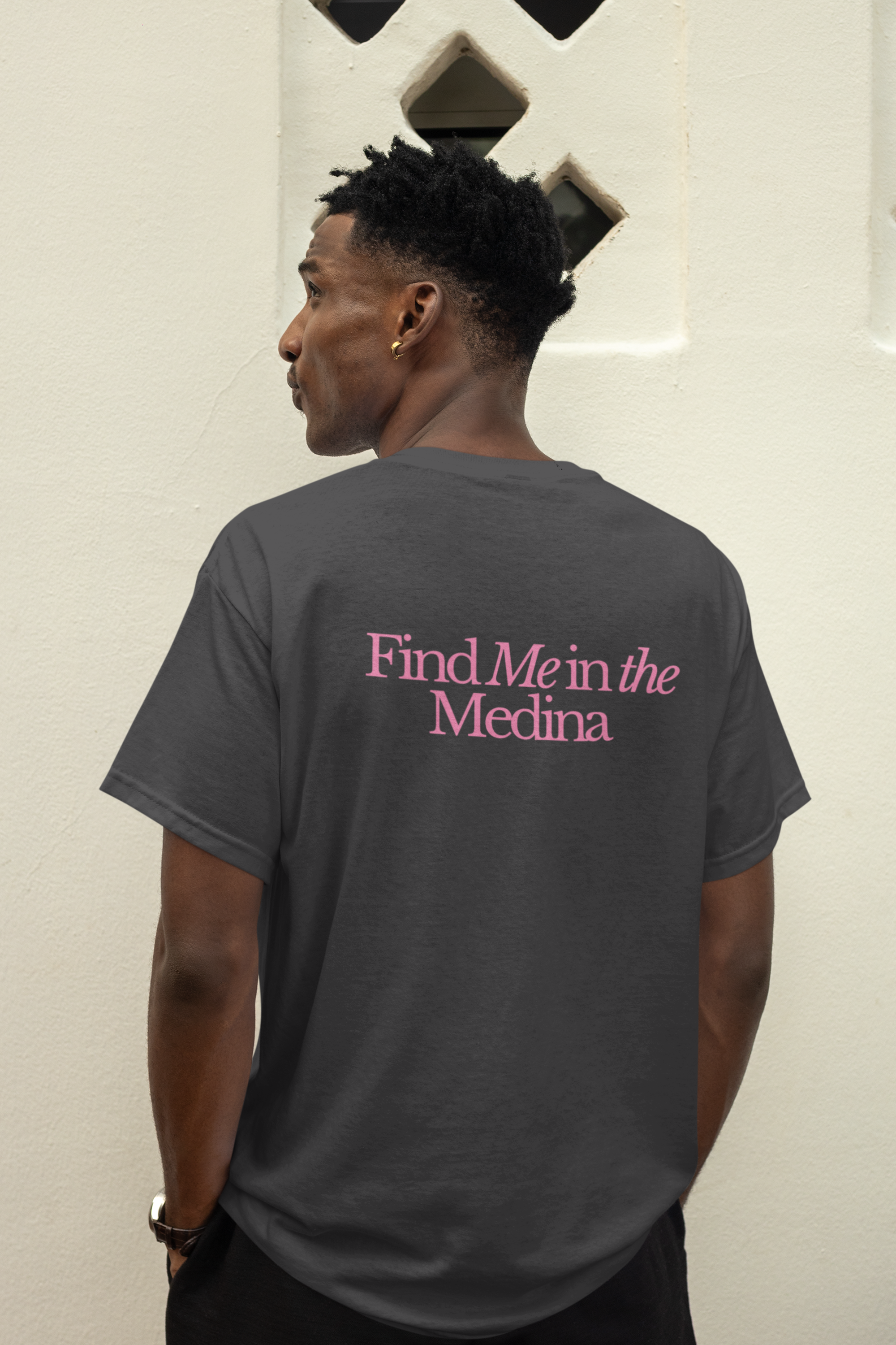 Back view mockup featuring a man with short hair wearing a T-shirt. Casual and stylish look, ideal for everyday fashion and modern streetwear