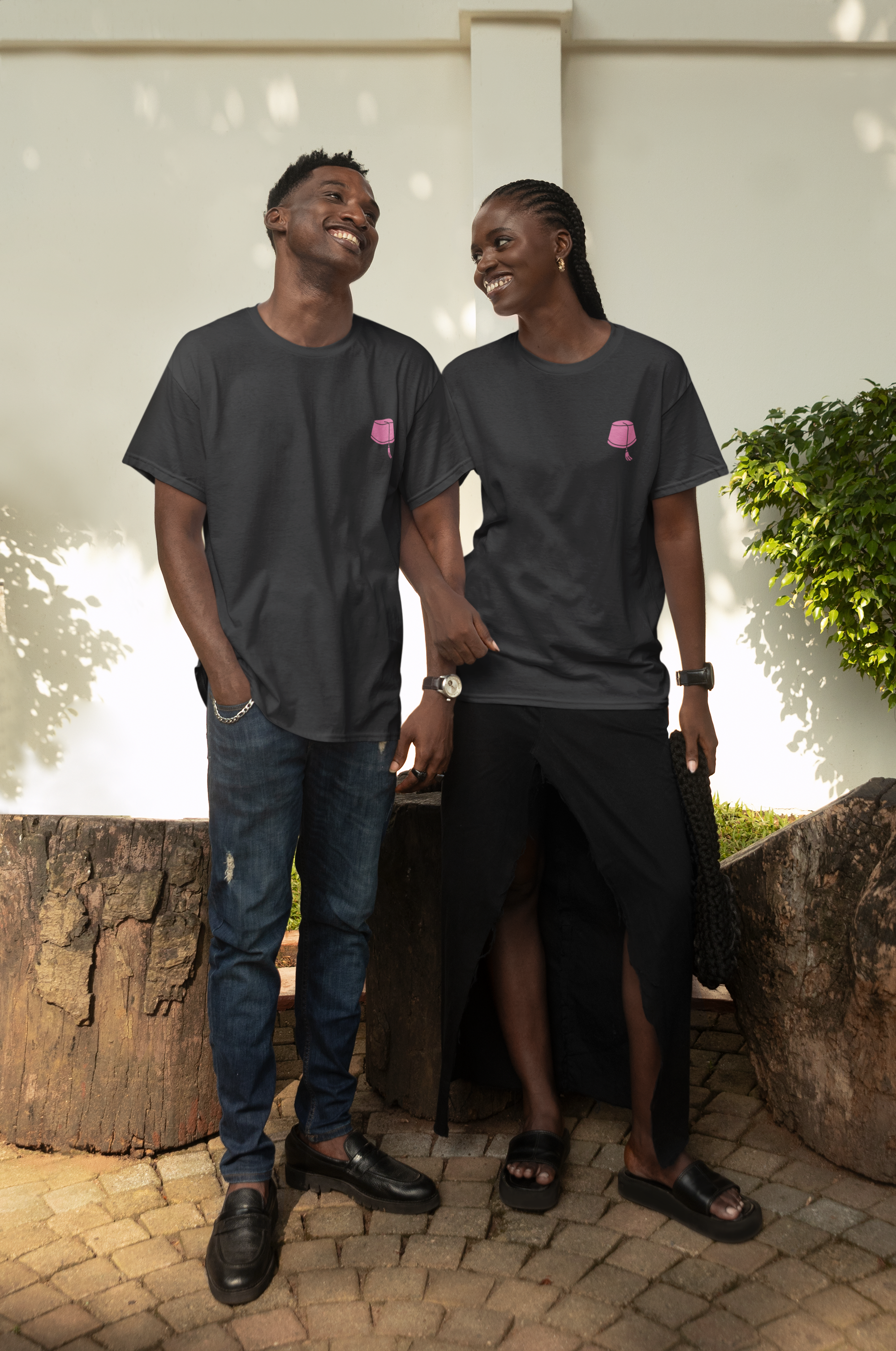tee mockup of a cheerful couple posing in a beautiful garden. Casual and joyful style, perfect for outdoor activities and relaxed fashion.